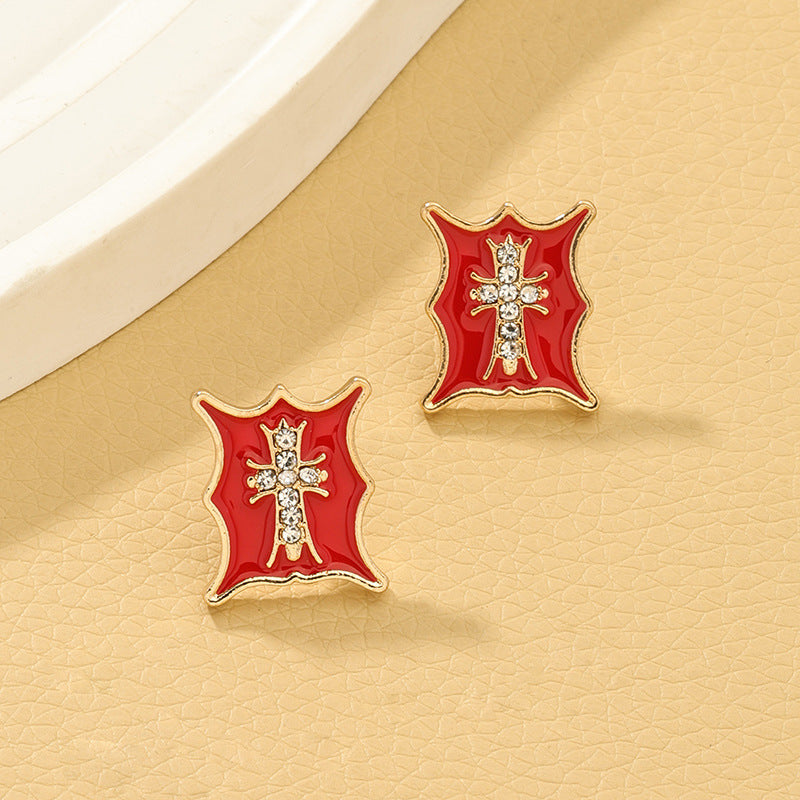 Cross Embossed Stud Earrings with a Modern Twist