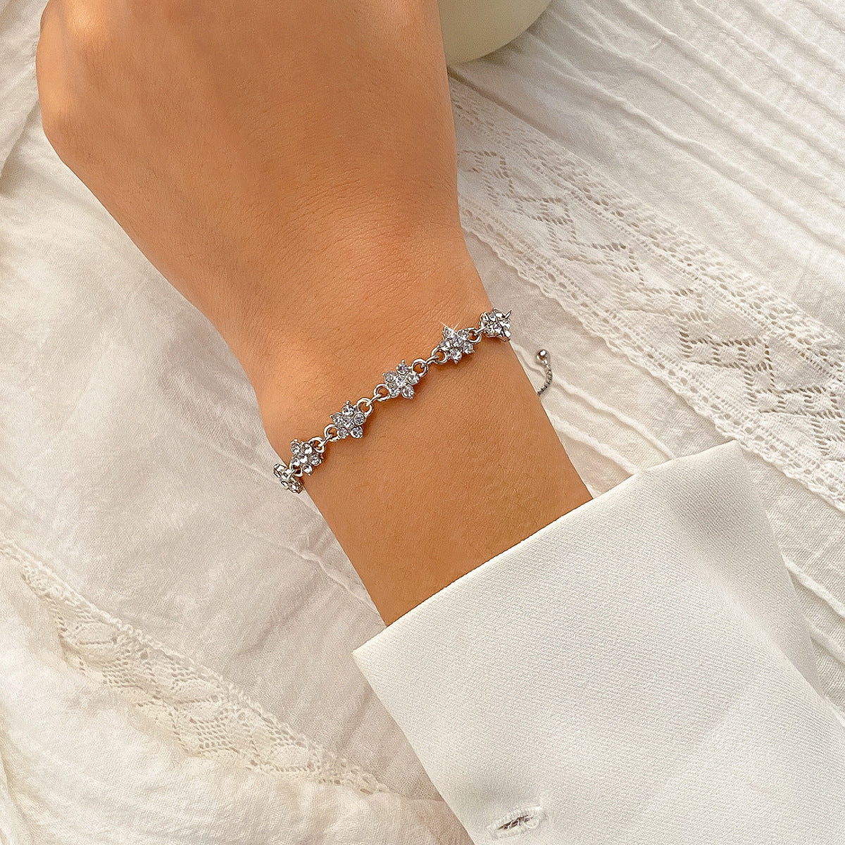 Rhinestone Adjustable Bracelet with Star and Flower Design