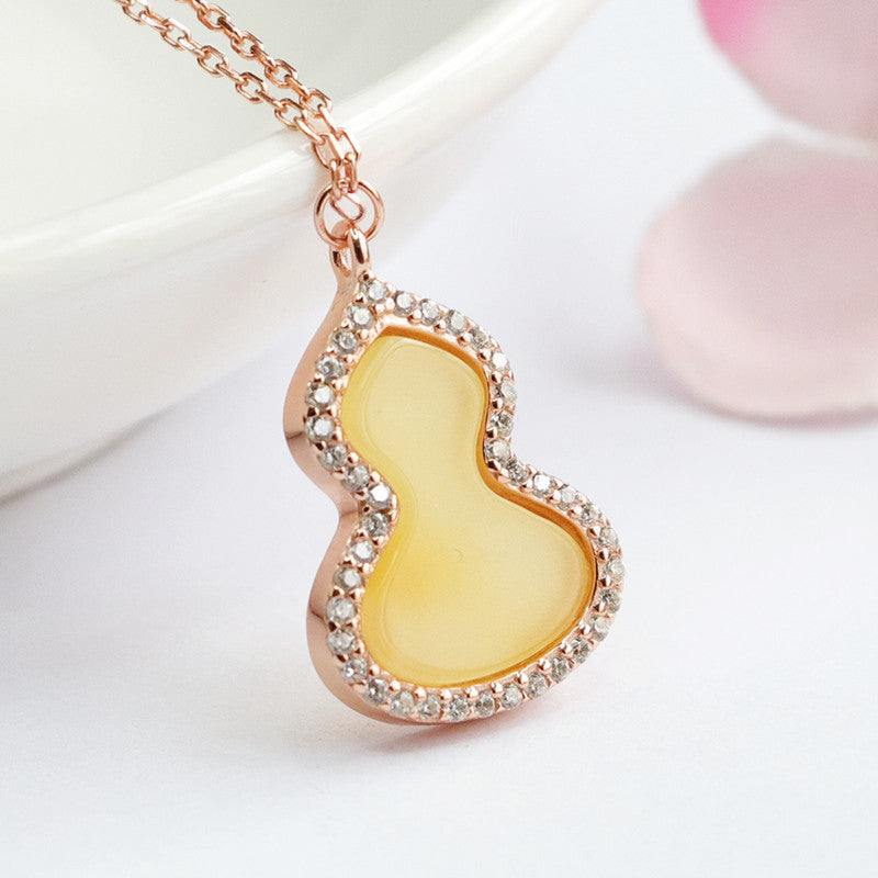 Sterling Silver Gourd Pendant with Beeswax Amber