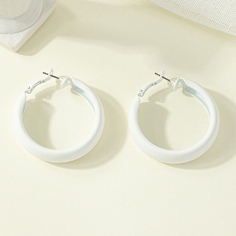 Korean-inspired Exaggerated Painted Circle Earrings with Sleek Design