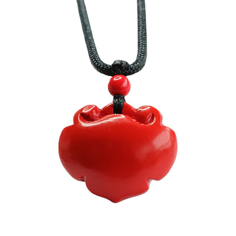 Cinnabar Stone Ruyi Lock Pendant with Red Sand Accents