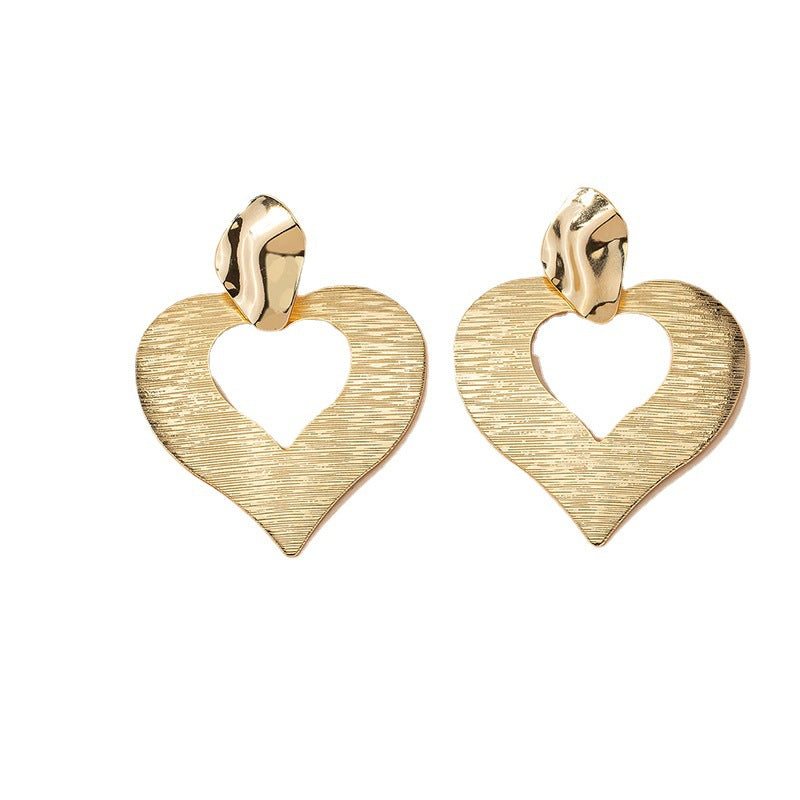 Peach Heart Hollow Stud Earrings with a Unique Design for Street Style Photographers