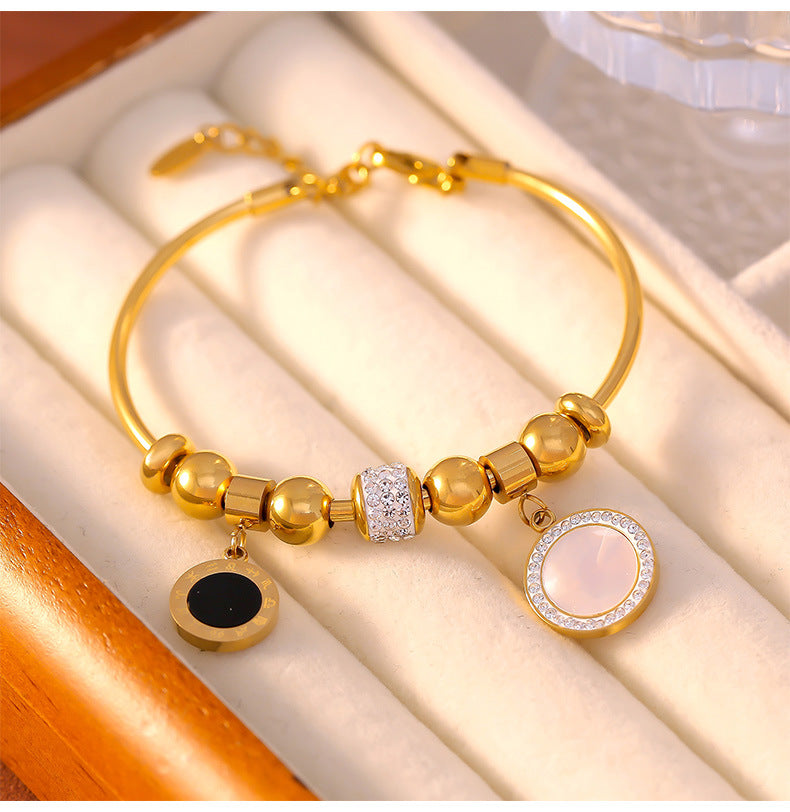 Elegant Titanium Steel Gold-Plated Bracelet with White Shell Geometric Zircon Ring