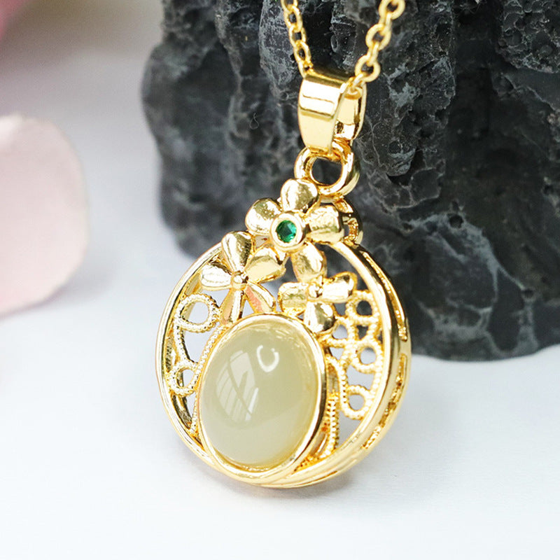 Elegant Hetian Jade Pendant with Sterling Silver Hollow Flower Design