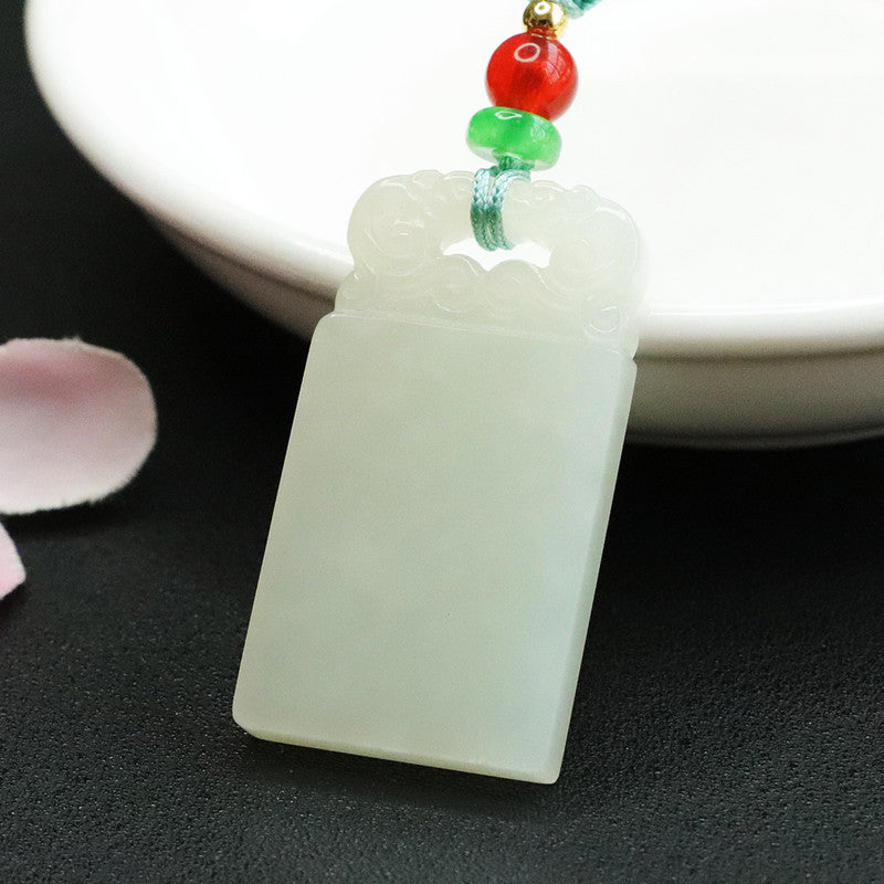 Jade Pendant with Auspicious Clouds Design and White Jade Necklace