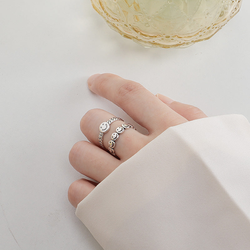 Row of Smiling Face Beading Opening Sterling Silver Ring