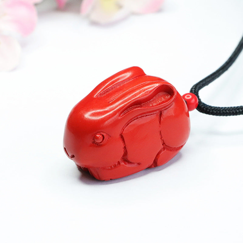 Cinnabar Rabbit Pendant with Red Sand Insets