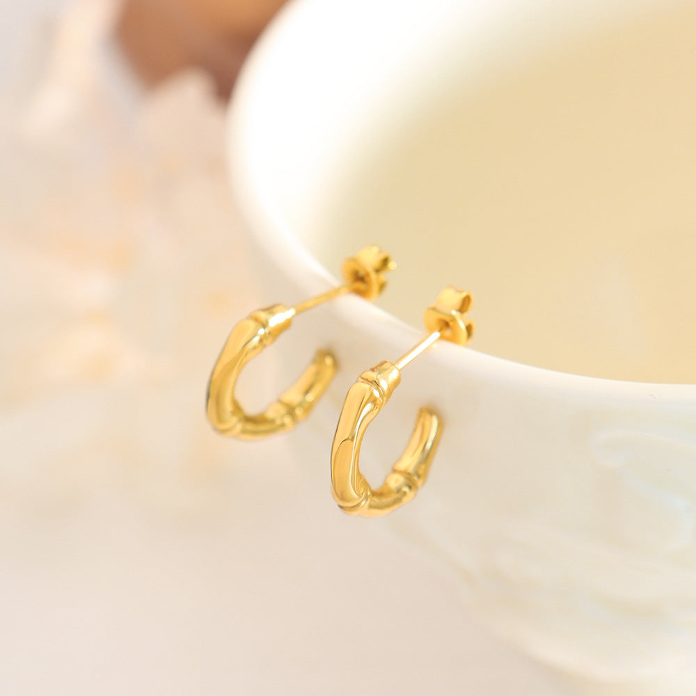 European & American Gold-Plated Stud Earrings with Unique C-shaped Design