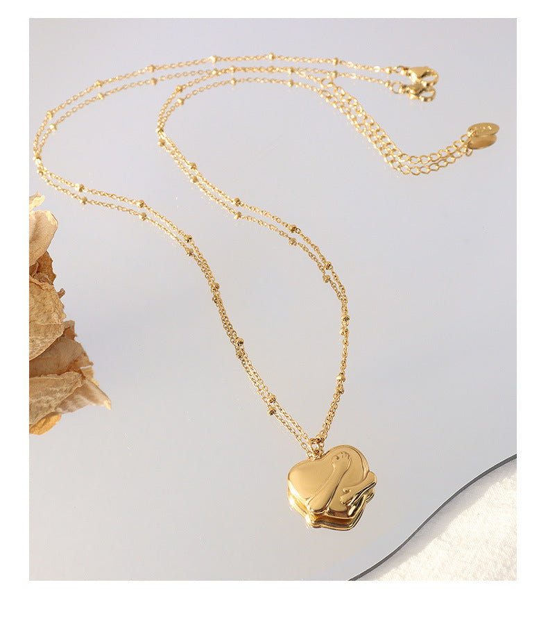 Glamorous Gold-Plated Necklace with Love Pendant and Hand Ornament