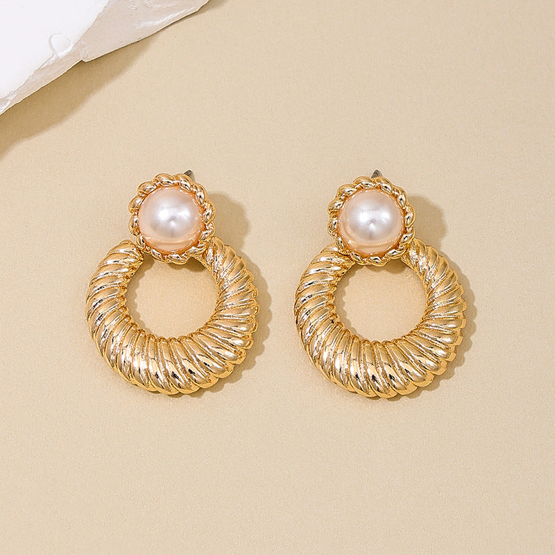 Extravagant Hollow Pearl Droplet Earrings by Planderful Collection