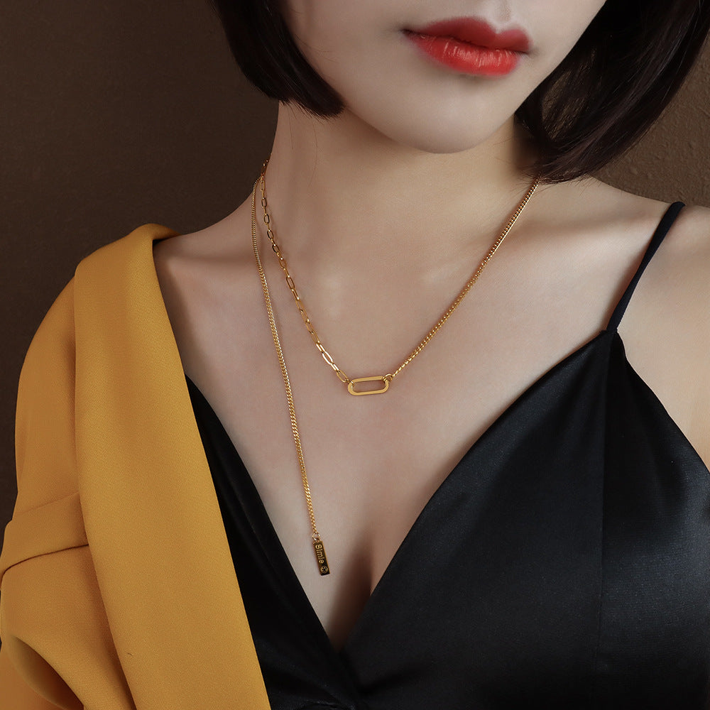 French Instagram Style Gold Tassel Necklace with Elliptical Geometry Pendant