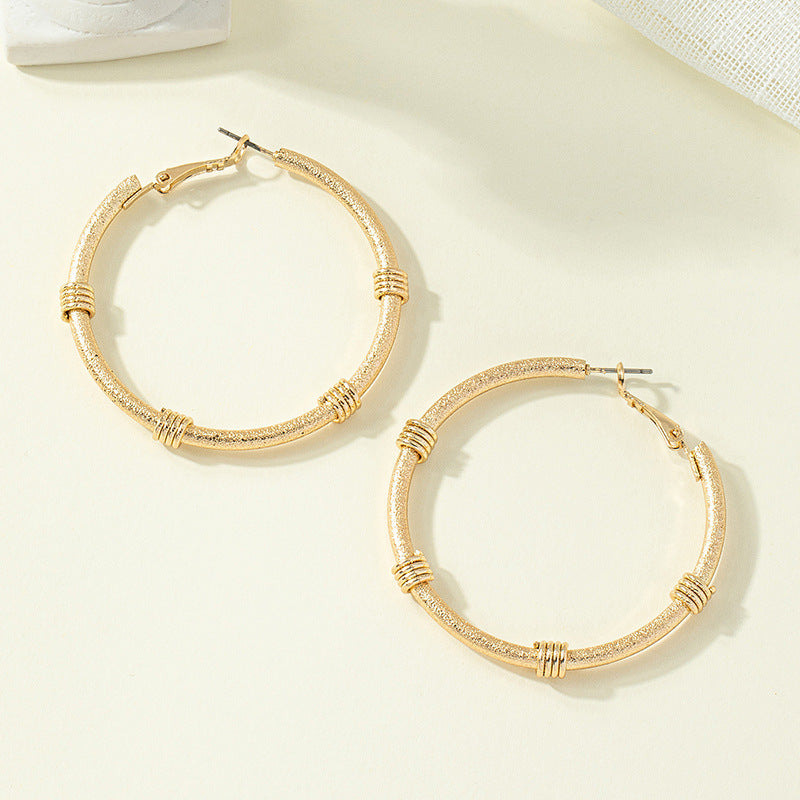 Vienna Verve Metal Circle Earrings with a Retro Touch