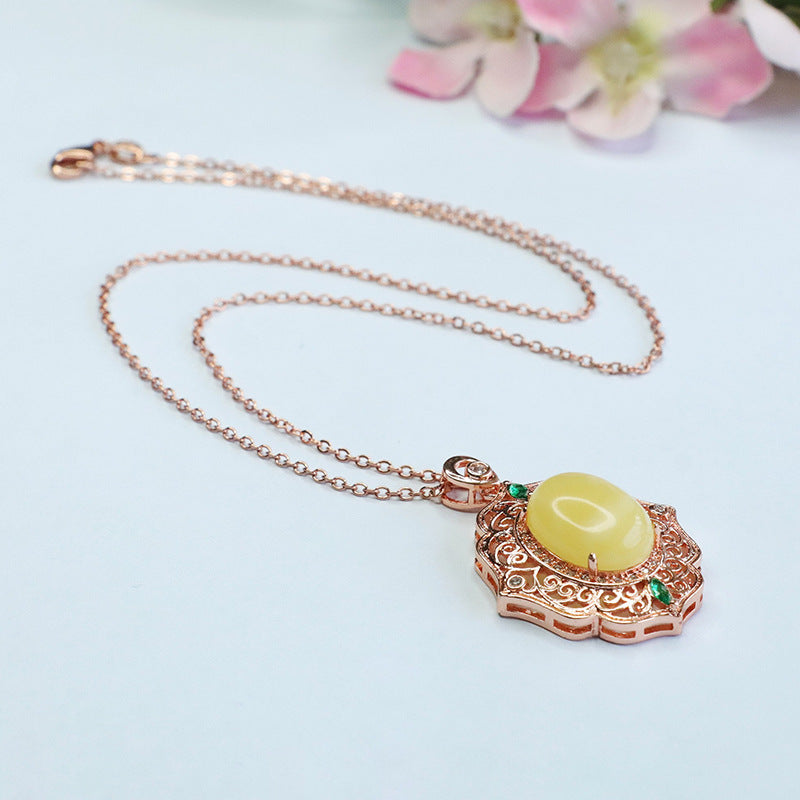 Amber Beeswax Pendant Necklace with Rose Gold Accents and Ethnic Influence