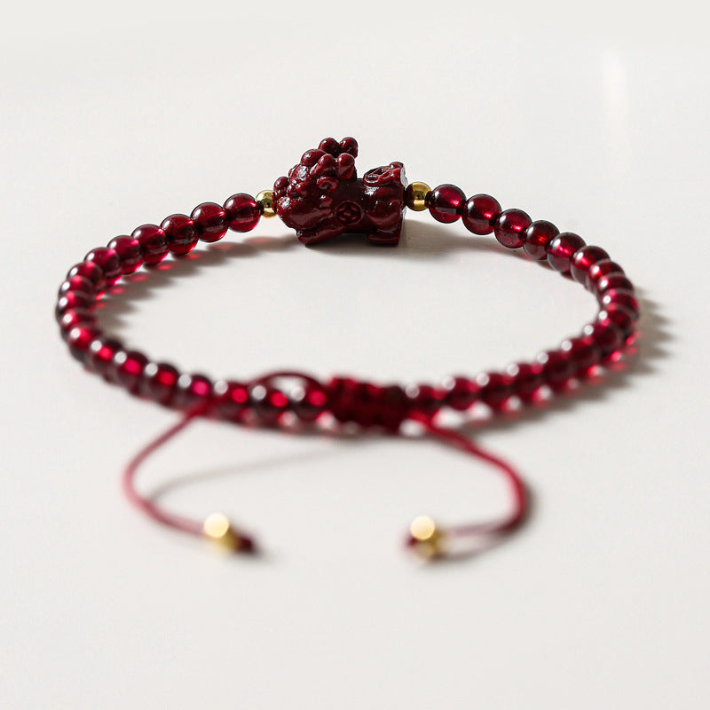 Hand-woven Garnet Beaded Bracelet by Planderful's Fortune's Favor Collection