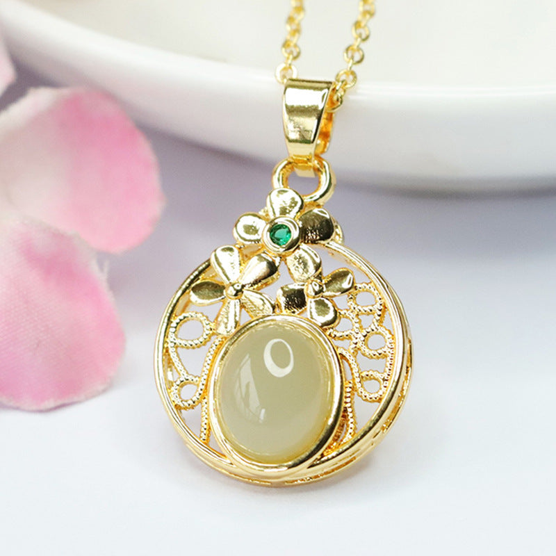 Elegant Hetian Jade Pendant with Sterling Silver Hollow Flower Design