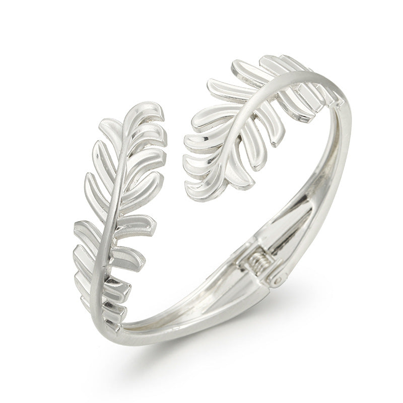 Leaf Design Gold Bracelet for Fashion-Forward Females - Vienna Verve Collection