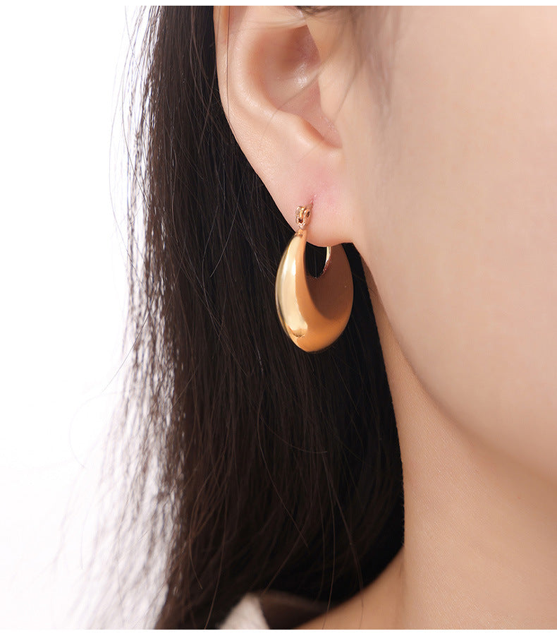 Glossy Gold-Plated U-Shaped Earrings with Geometric Design