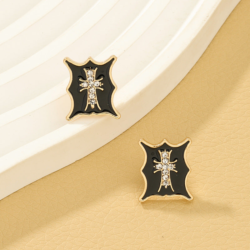 Cross Embossed Stud Earrings with a Modern Twist