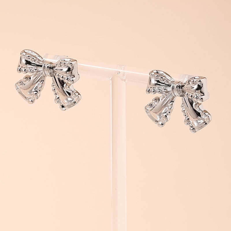 Charming Vienna Verve Metal Bow Earrings for Women