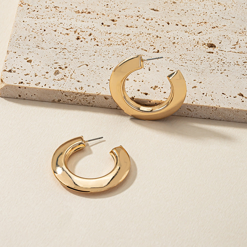 Golden Geometric C-shaped Earrings - Elegant European & American Jewelry for Women