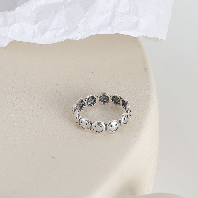 Row of Smiling Face Beading Opening Sterling Silver Ring