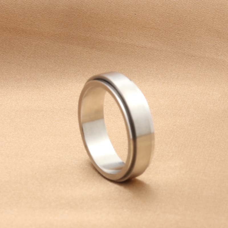 Titanium Steel Retro Smooth Ring for Men - Trendy Rotating Accessory from Planderful Collection