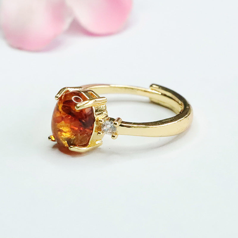 Elegant Sterling Silver Ring with Beeswax Amber Floral Detail