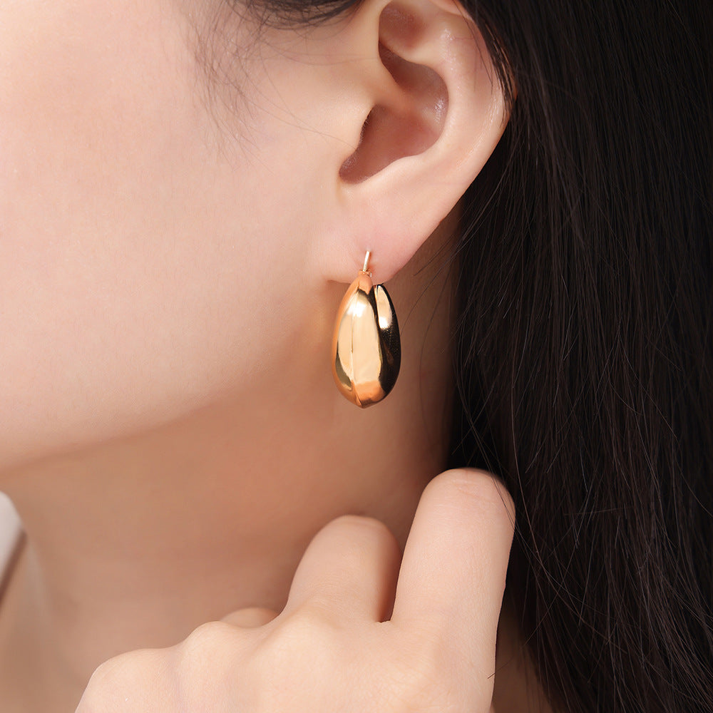 Glossy Gold-Plated U-Shaped Earrings with Geometric Design