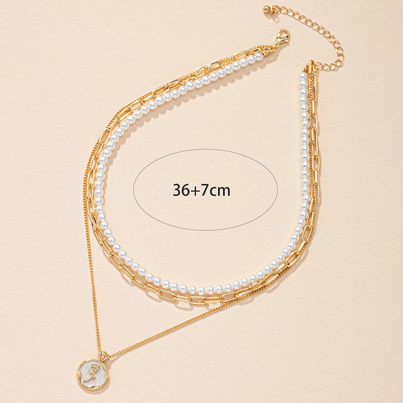 Elegant Pearl Layered Necklace with Floral Tag - Vienna Verve Collection