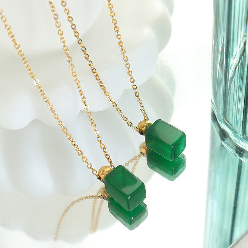 Emerald Glass Pendant Necklace with a Vintage Twist in Gold-Plated Titanium Steel