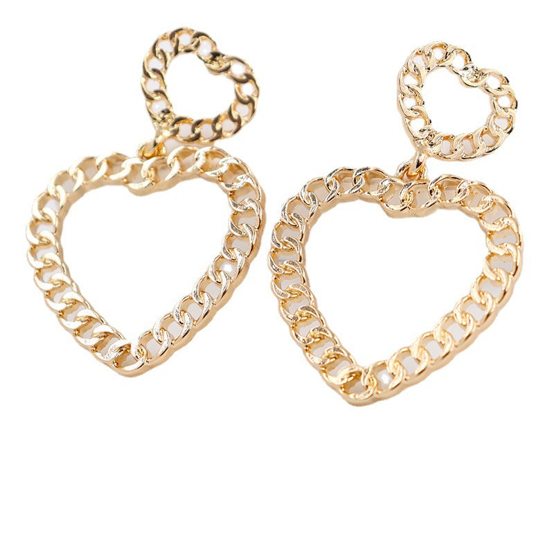 Hollow Geometric Alloy Earrings with Peach Heart Design - Vienna Verve