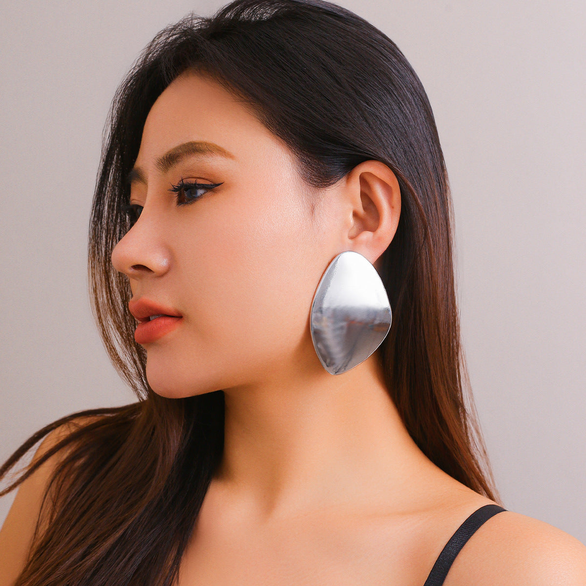 Bold Metal and Glowing Surface Statement Ear Accessories