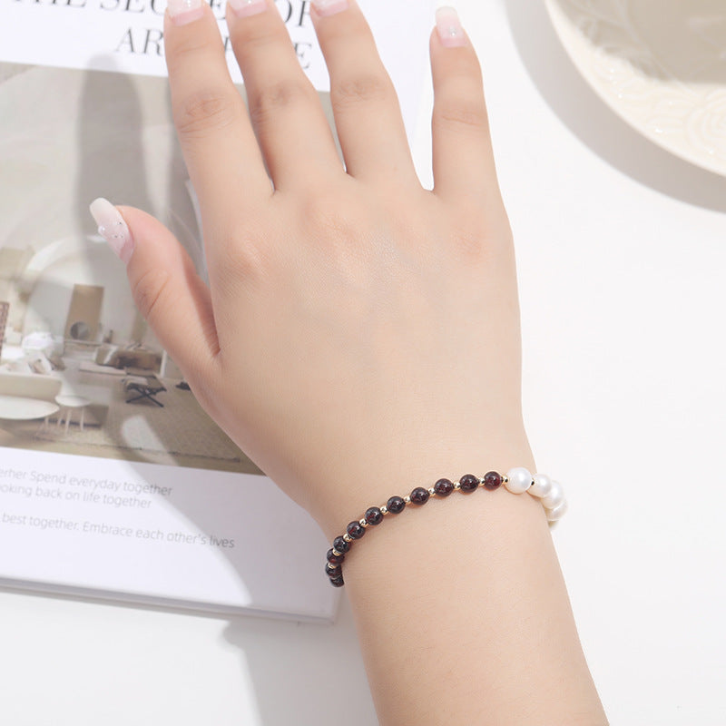 Fortune's Favor Garnet and Pearl Sterling Silver Elbow Bracelet