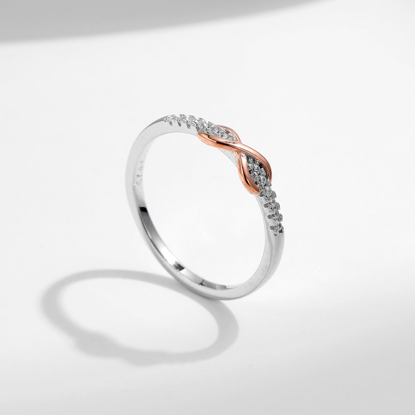 S925 Sterling Silver Mobius Ring with Zircon Arrangement and Rose Gold Plating