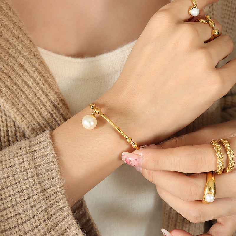 Fashionable Chinese-Inspired Retro Bracelet with Imitation Pearl and Steel Ball Accents