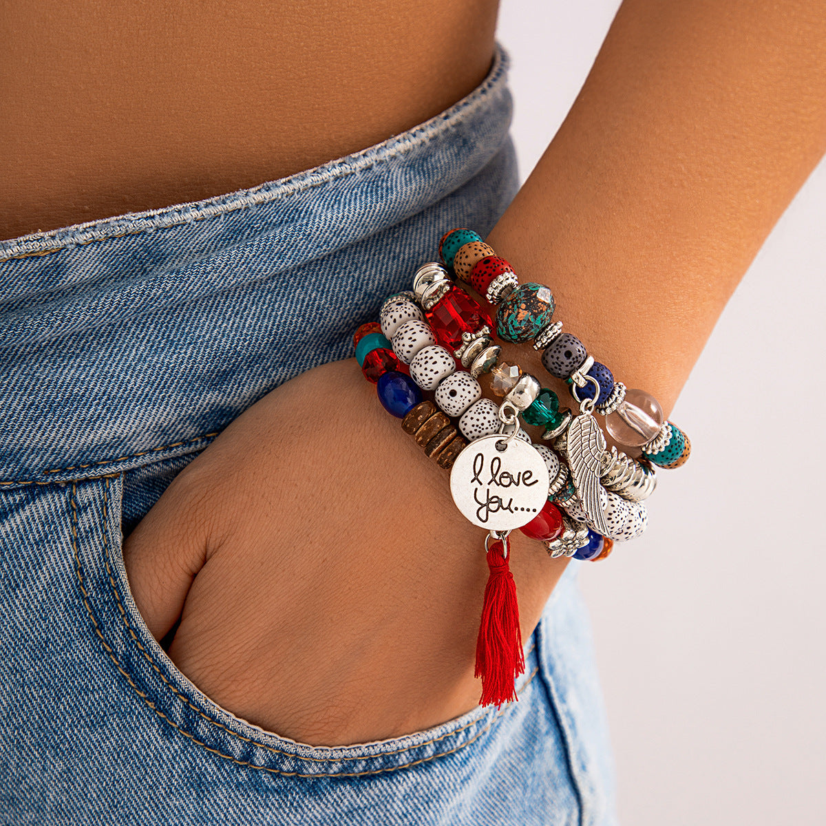 Chinese Style Handmade Beaded Tassel Bracelet with Glass and Feather Accents