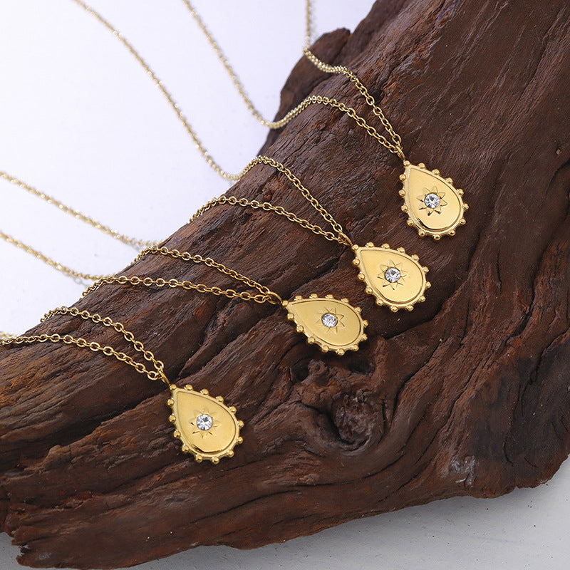 Golden Droplet Pendant Necklace with Geometric Zircon Inlay