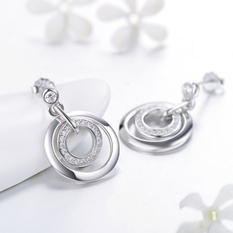 Luxurious Sterling Silver Earrings with Zircon Embellishments