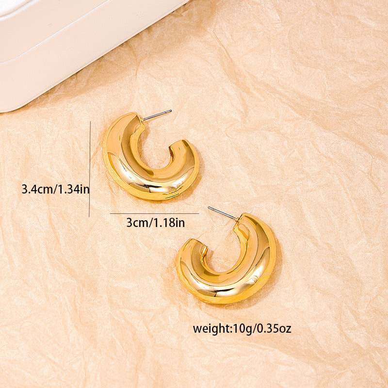 Chic Vienna Verve Metal Earrings with Glossy Circular Design