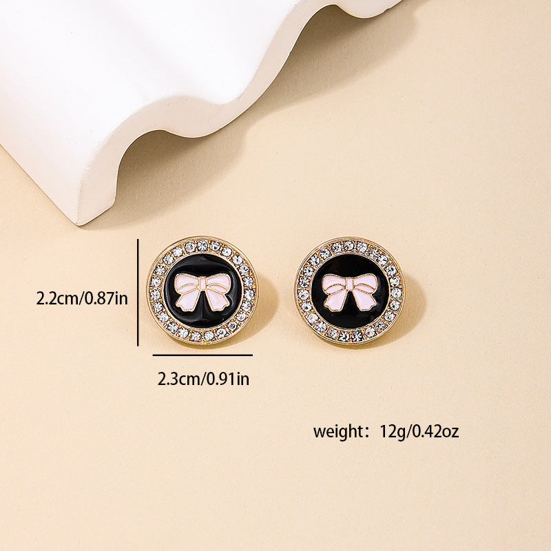 Bow Earrings and Geometric Rings Set with a touch of Vintage Charm