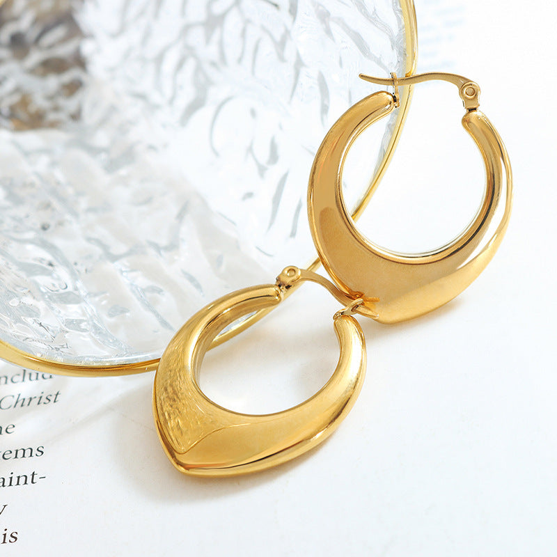 Golden Geometric Titanium Earrings with European-American Flair