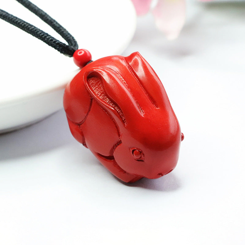 Cinnabar Rabbit Pendant with Red Sand Insets