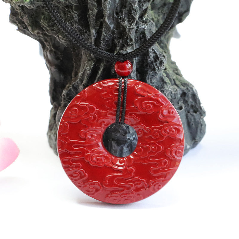 Prosperity and Elegance Sterling Silver Cinnabar Pendant with Auspicious Cloud Design