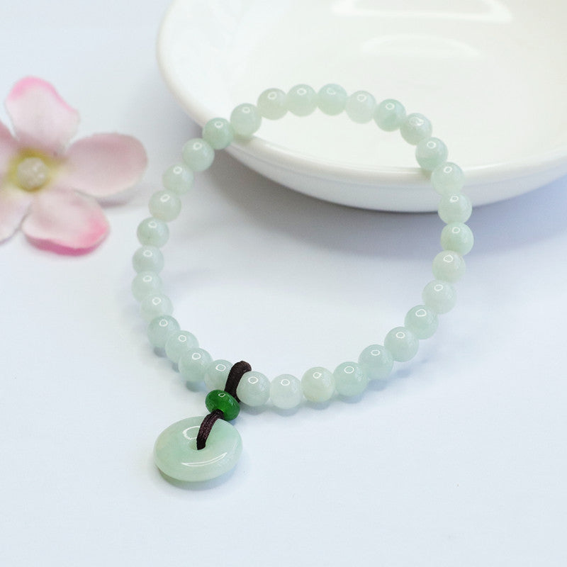 Light Green Jade Bracelet with Sterling Silver Safety Buckle and Tassel Detail