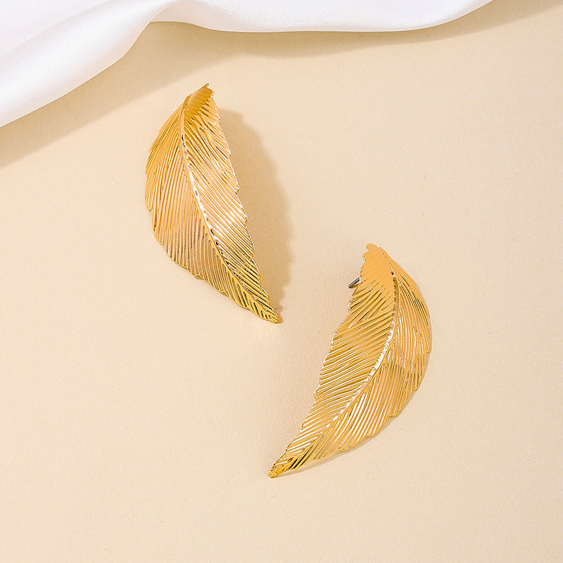 Feathered Metal Leaf Earrings with a Vintage Vibe