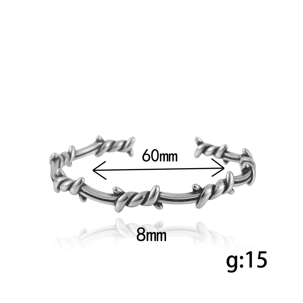 Titanium Steel Men's Winding Bracelet - Edgy Thorn Design for Contemporary Style