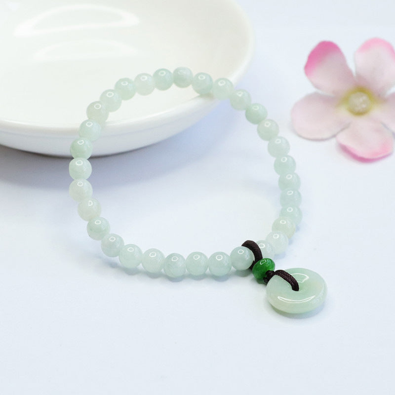 Light Green Jade Bracelet with Sterling Silver Safety Buckle and Tassel Detail