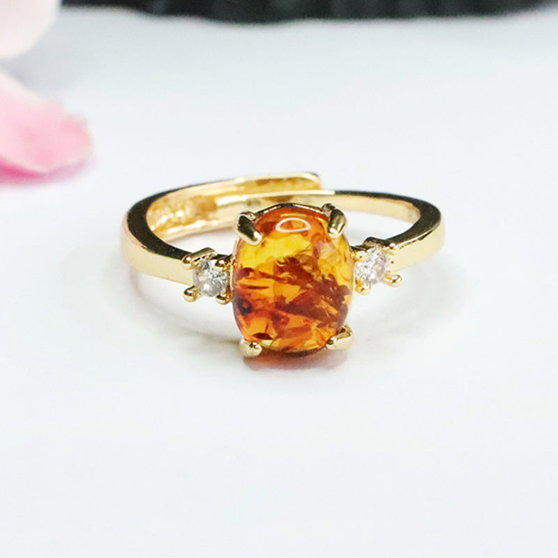 Elegant Sterling Silver Ring with Beeswax Amber Floral Detail