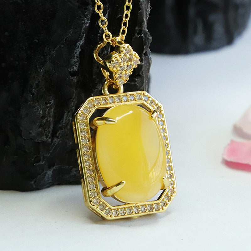 Honey Amber Zircon Oval Pendant in Sterling Silver