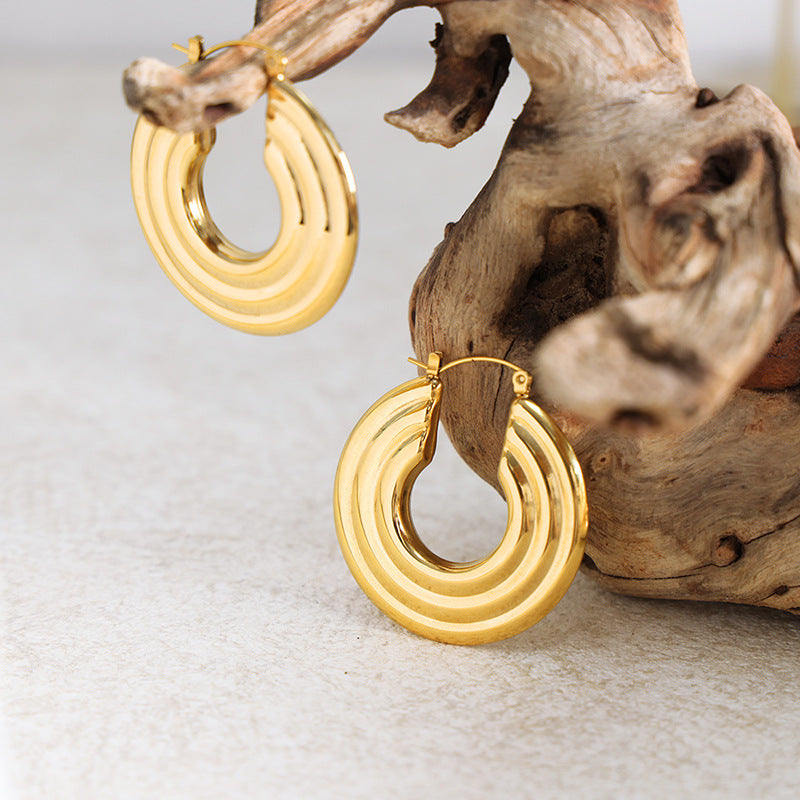 Fashionable Titanium and Gold-Plated Circular Earrings for Women